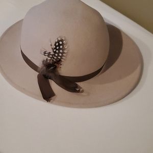 Cream colored hat with Brown ribbon